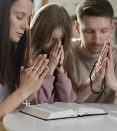 christian-people-praying-together-medium-shot